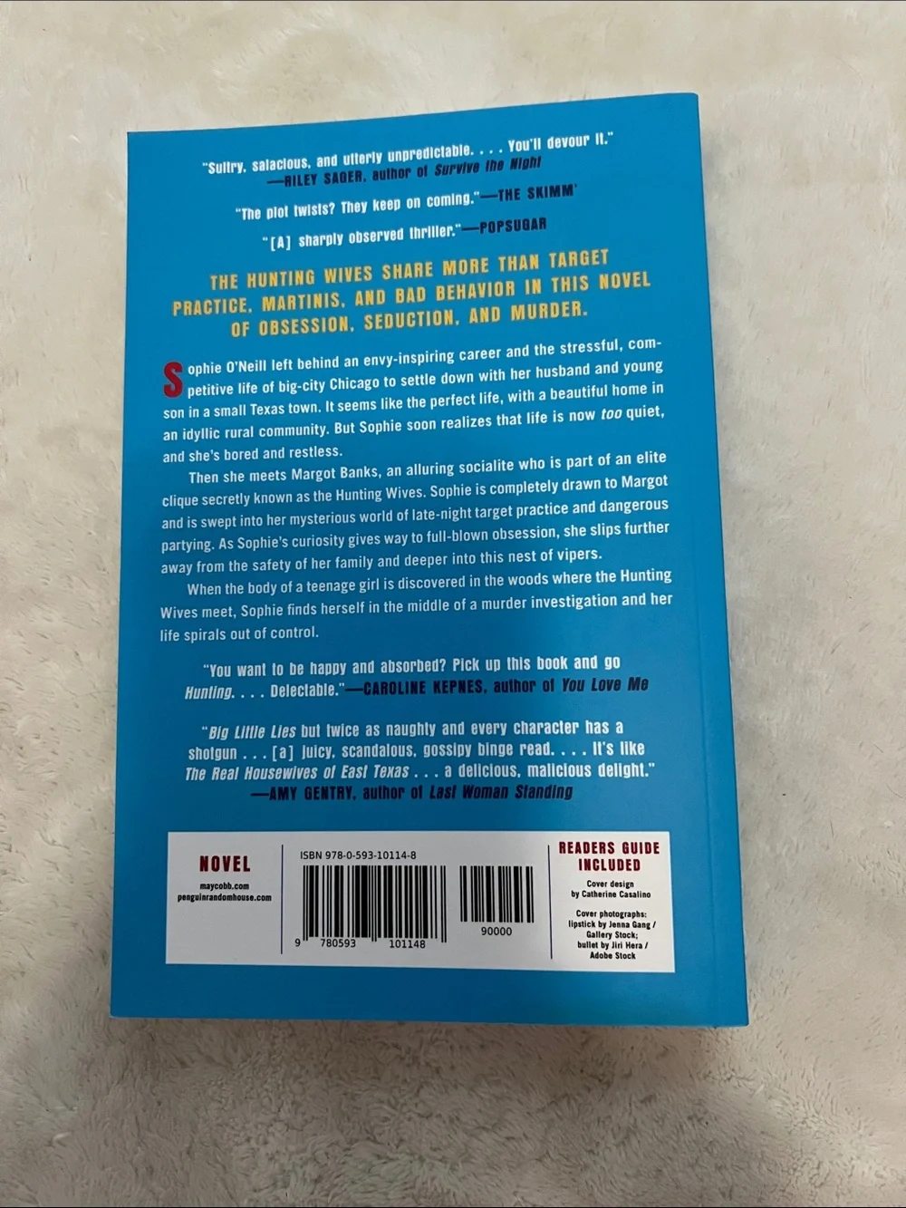 The Hunting Wives by — Blue Cover Paperback